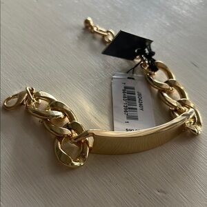 Men’s ID bracelet, hollow hold toned, new with tags.